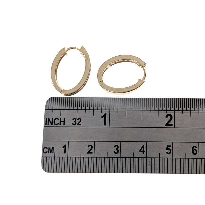 Channel Set Diamond Hoop Earrings in Yellow Gold
