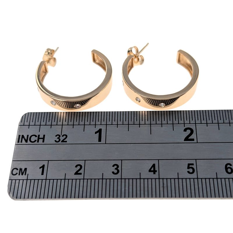 Channel Set Diamond Hoop Earrings in Yellow Gold