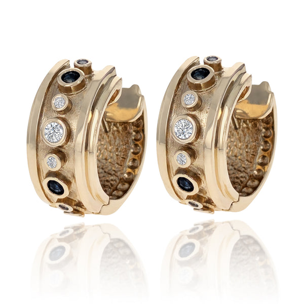 Bezel Set Diamond and Sapphire Huggie Earrings in Yellow Gold