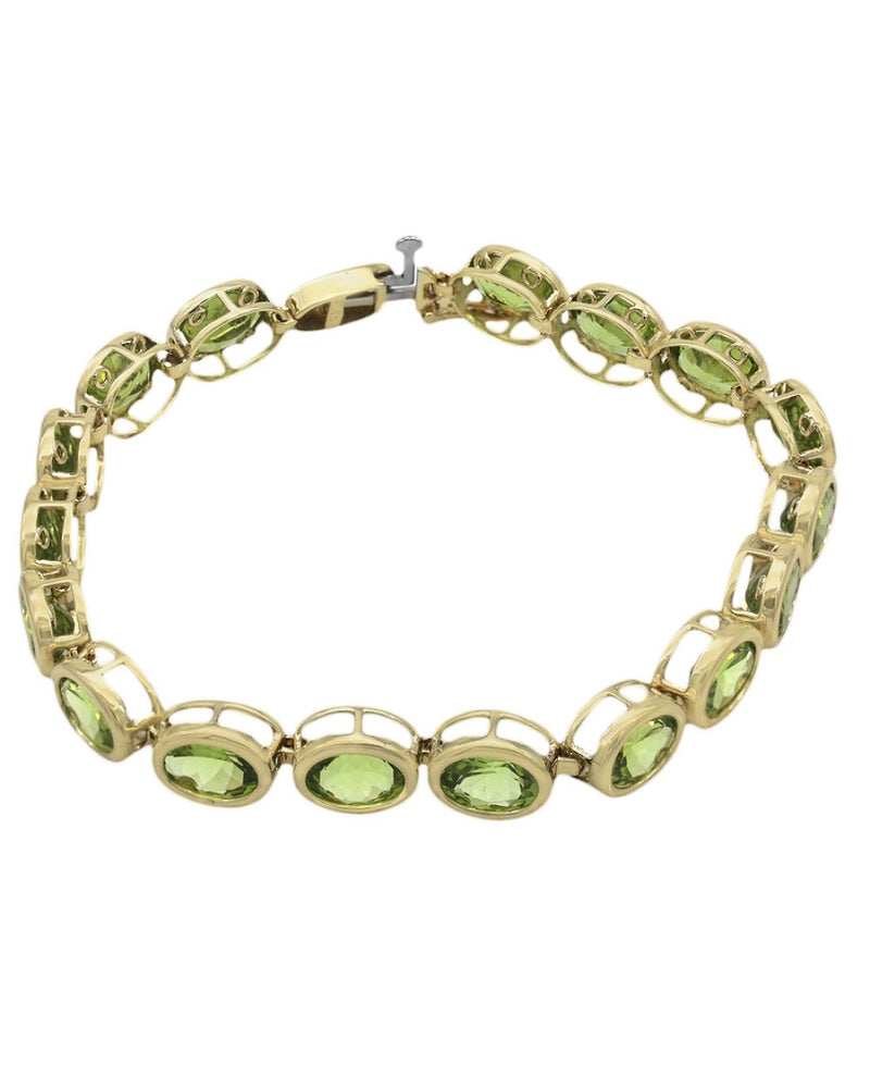 Peridot Inline Bracelet in Yellow Gold