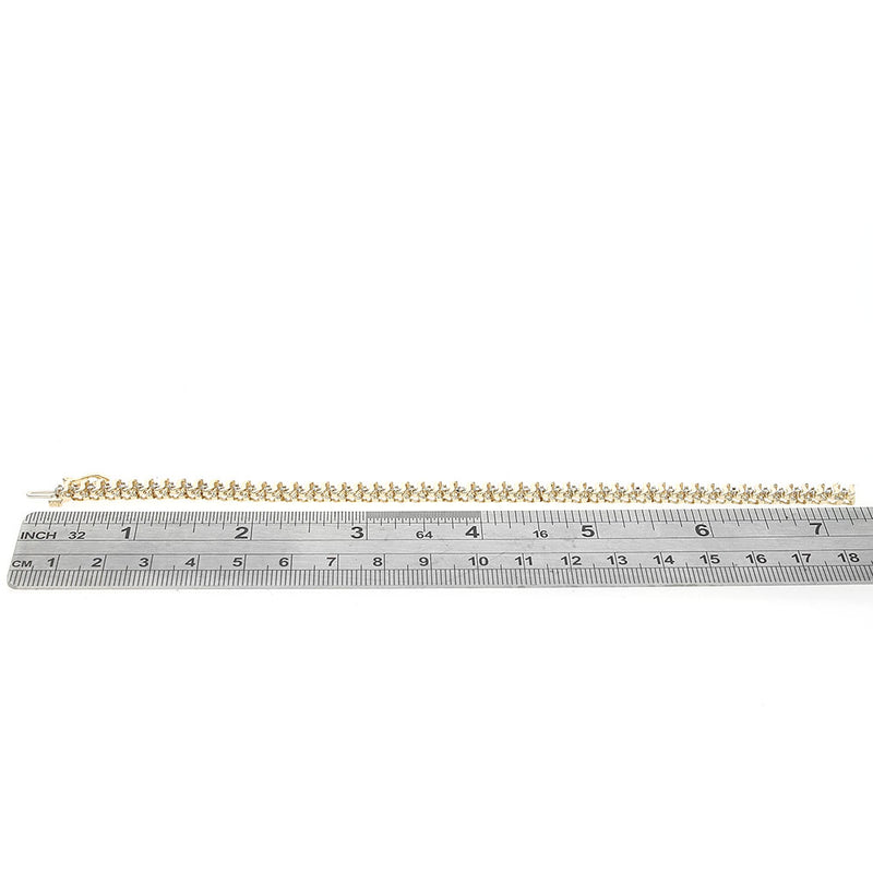 Alternating Diamond S Curve Inline Bracelet in Yellow Gold