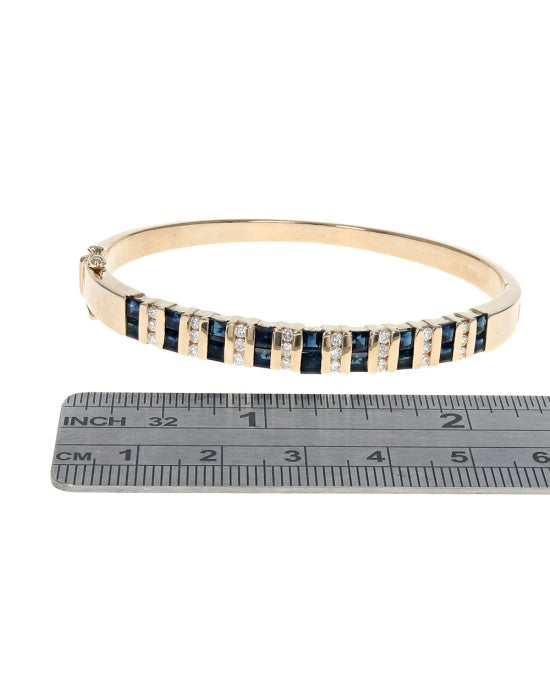 Alternating Blue Sapphire and Diamond Higned Bangle Bracelet in Yellow Gold