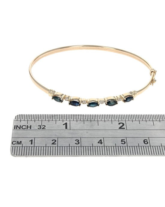 Alternating Blue Sapphire and Diamond Bangle Bracelet in Yellow Gold