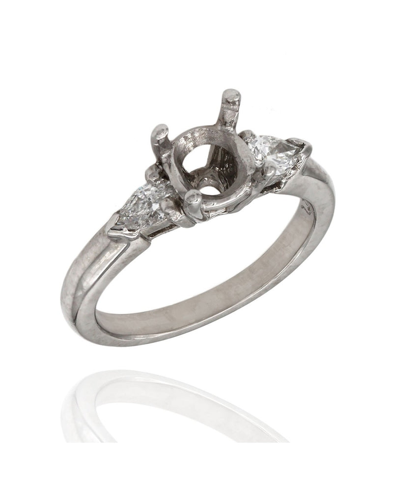 Pear Shape Three Stone Diamond Mounting in Platinum