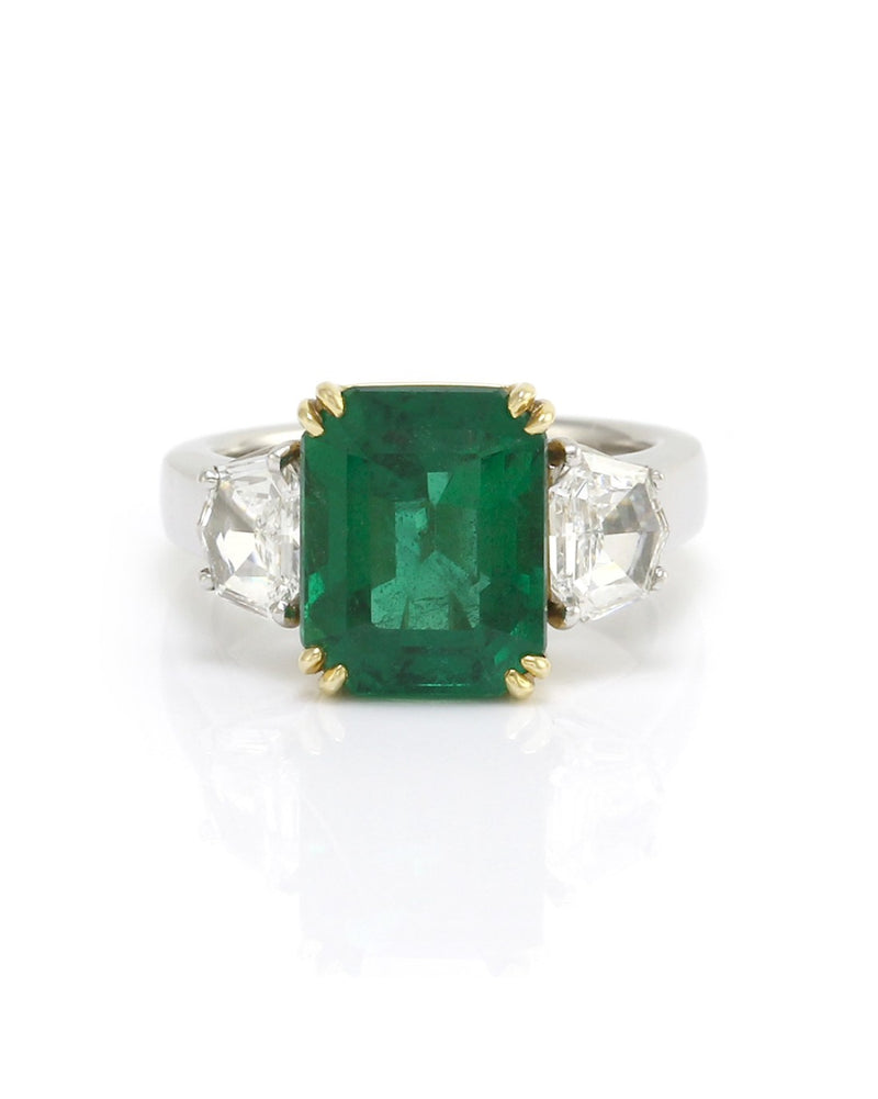 Emerald Cut Emerald with Trapezoid Shaped Diamonds in Platinum and Gold