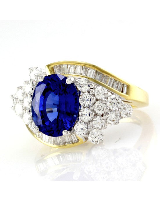 Oval Tanzanite Bypass Ring w/ Diamond Cluster in Two Tone 18K Gold