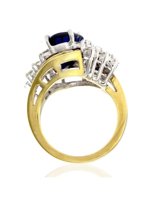 Oval Tanzanite Bypass Ring w/ Diamond Cluster in Two Tone 18K Gold