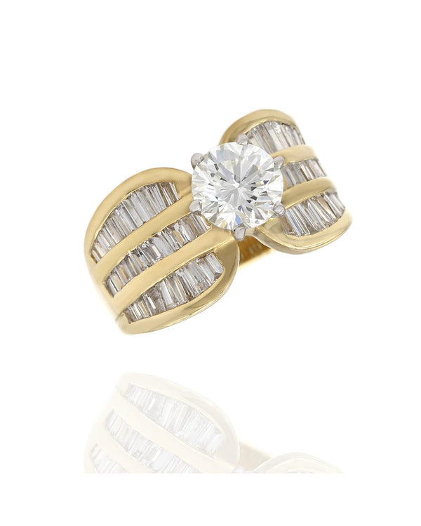 Round and Baguette Diamond Ring in Gold