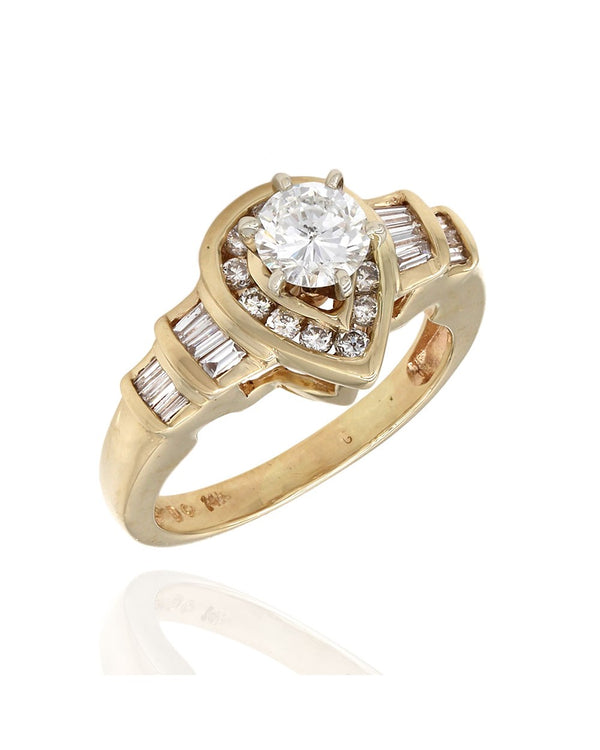 Round and Baguette Diamond Pear Shaped Ring in Gold