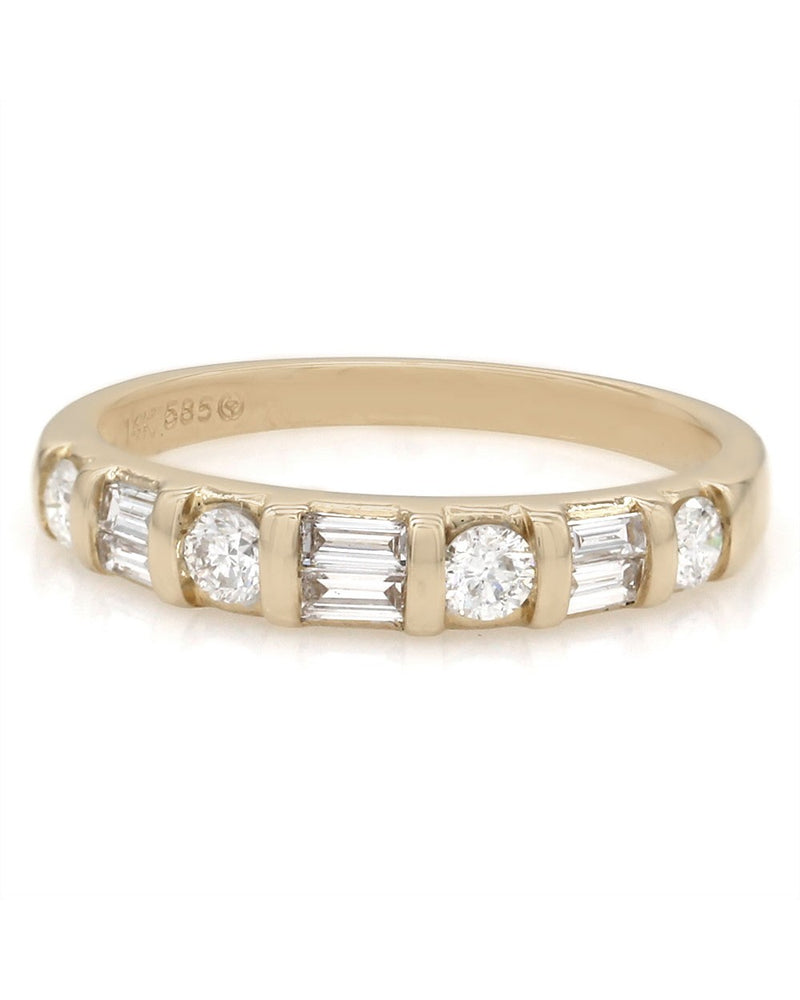 Round and Baguette Diamond Ring in Gold