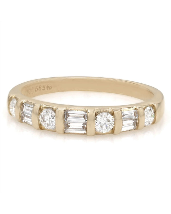 Round and Baguette Diamond Ring in Gold