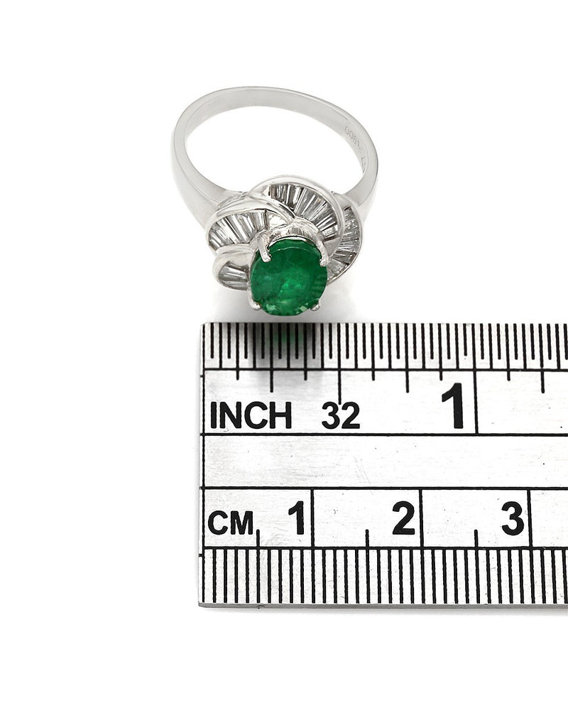 Oval Emerald Ring with Baguette Diamond Channel Swirl in Platinum