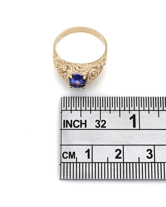 Tanzanite Solitaire Scroll Motif Ring in 14y