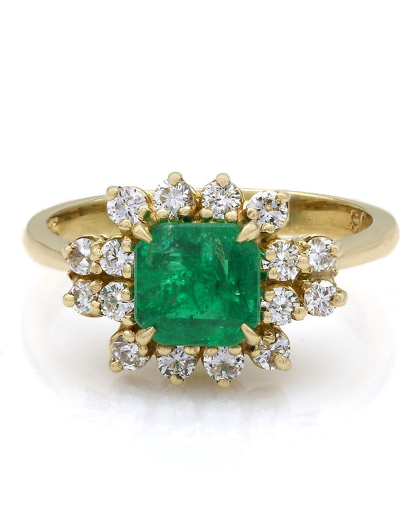 Emerald and Diamond Halo Ring in Yellow Gold