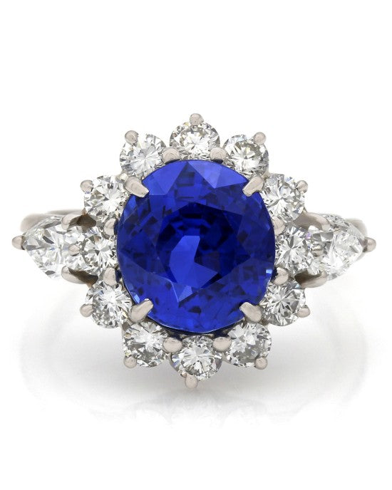 Oval Sapphire and Diamond Halo Ring in Platinum