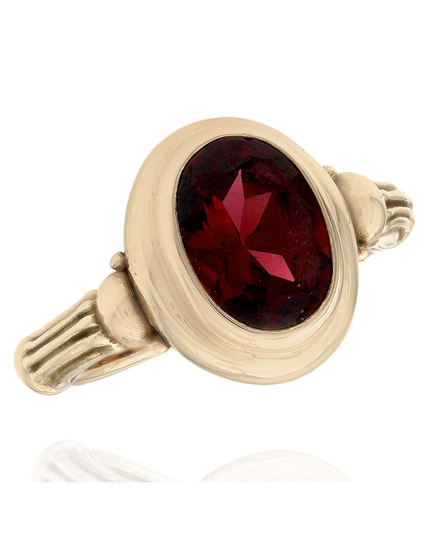 Oval Garnet Ring in Yellow Gold