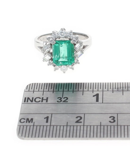 Emerald and Diamond Halo Ring in Platinum