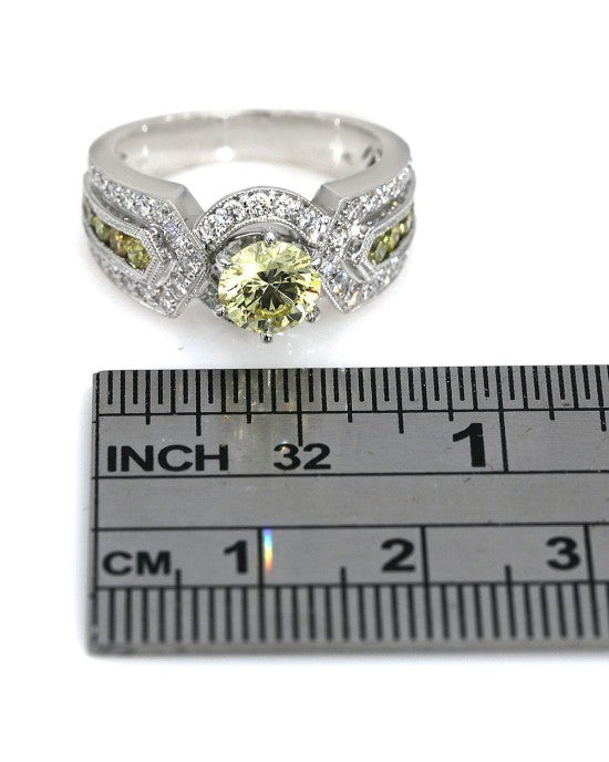 GIA Certified 1.02 Fancy Yellow Round Brilliant Cut Diamond Solitaire Ring in 14KW