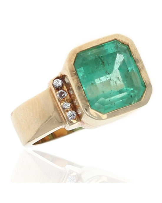 Emerald Cut Emerald and Diamond Accent Ring in Yellow Gold