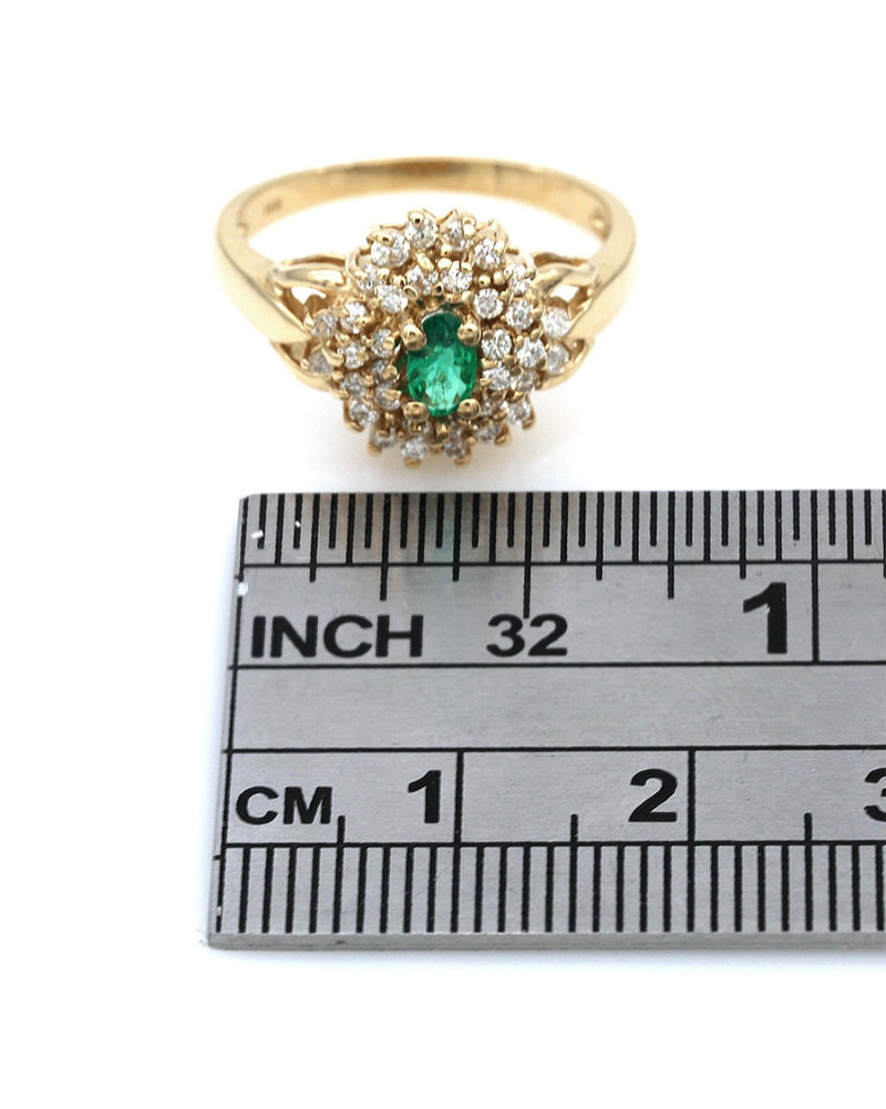 Emerald and Diamond Cluster Ring in Yellow Gold