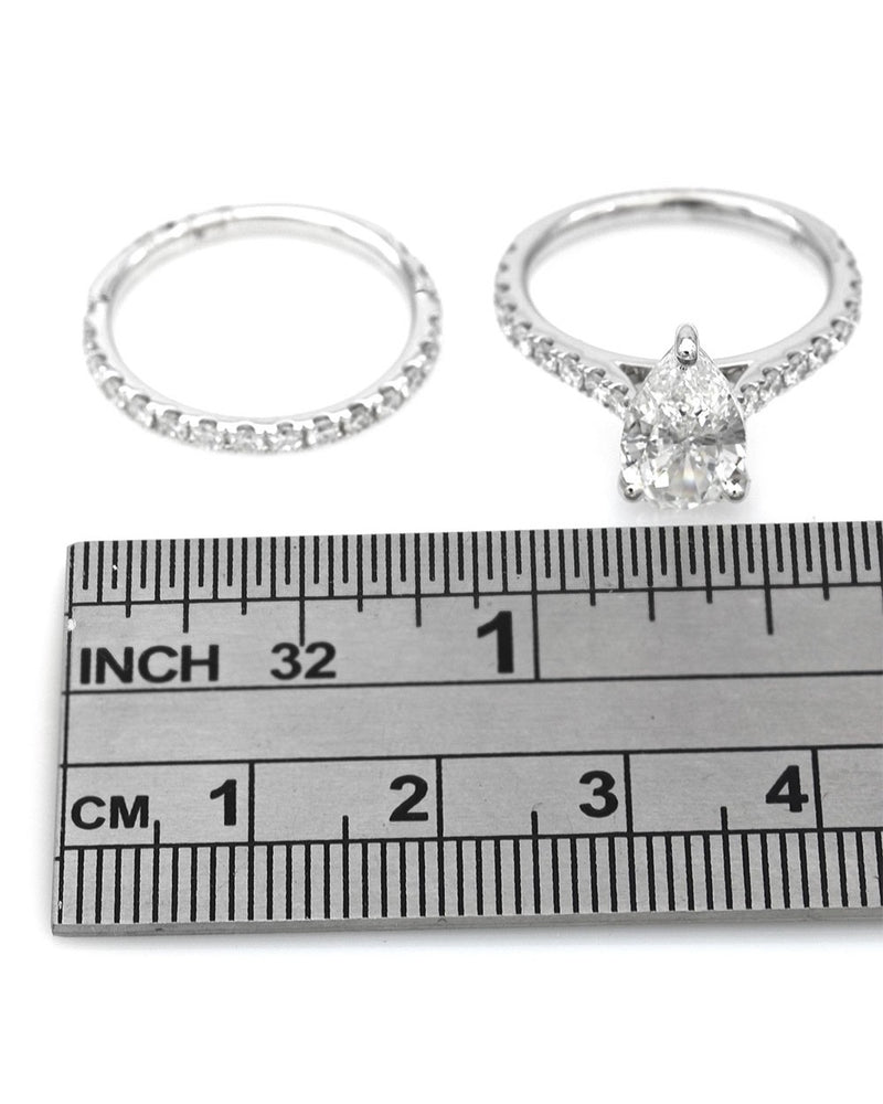 GIA Certified Pear Cut Diamond Solitaire Engagement Ring Set in 18KW