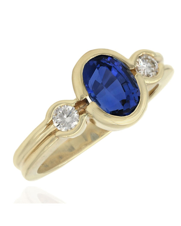 Blue Sapphire and Diamond Accent Ring in Yellow Gold