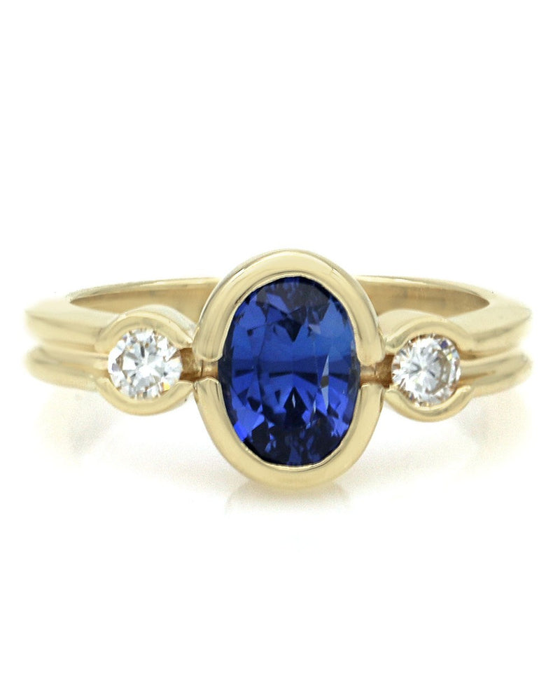 Blue Sapphire and Diamond Accent Ring in Yellow Gold