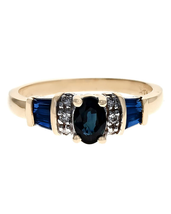 Blue Sapphire and Diamond Accent Ring in Yellow Gold