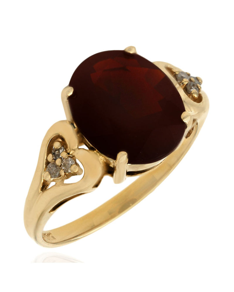 Garnet and Diamond Accent Ring in Yellow Gold