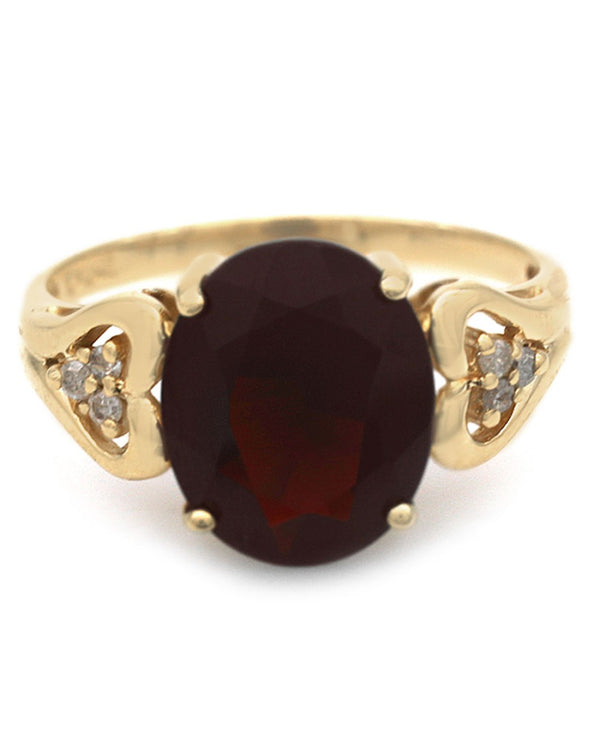 Garnet and Diamond Accent Ring in Yellow Gold