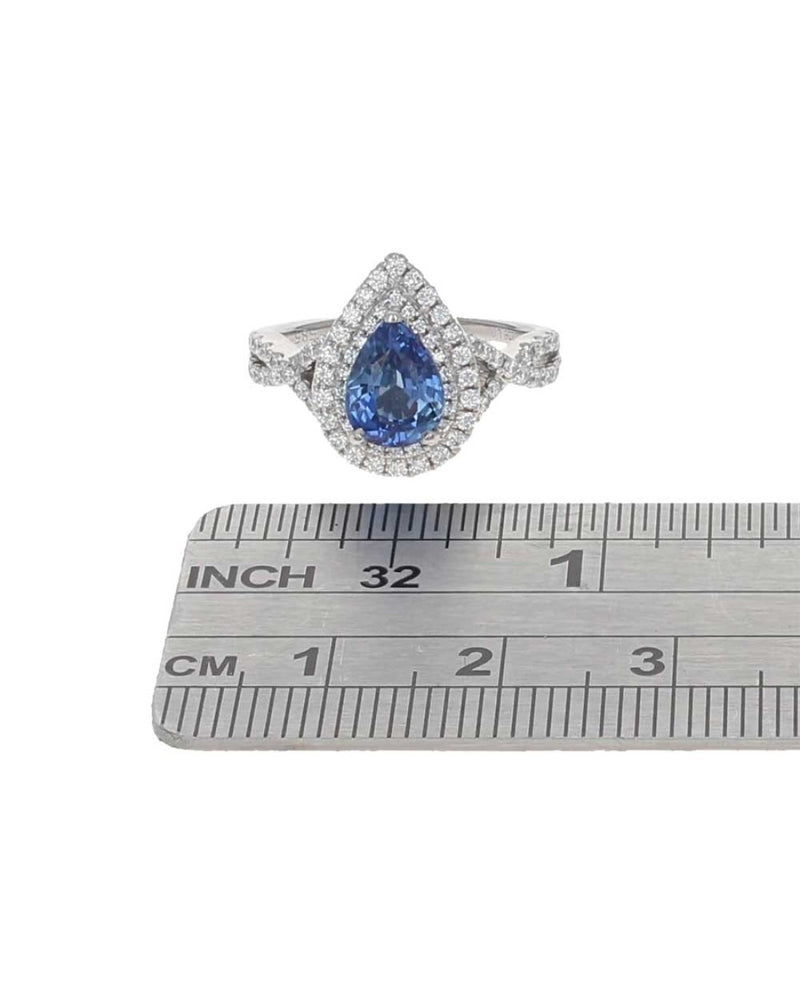 Blue Sapphire and Diamond Double Halo Crossover Ring in White Gold