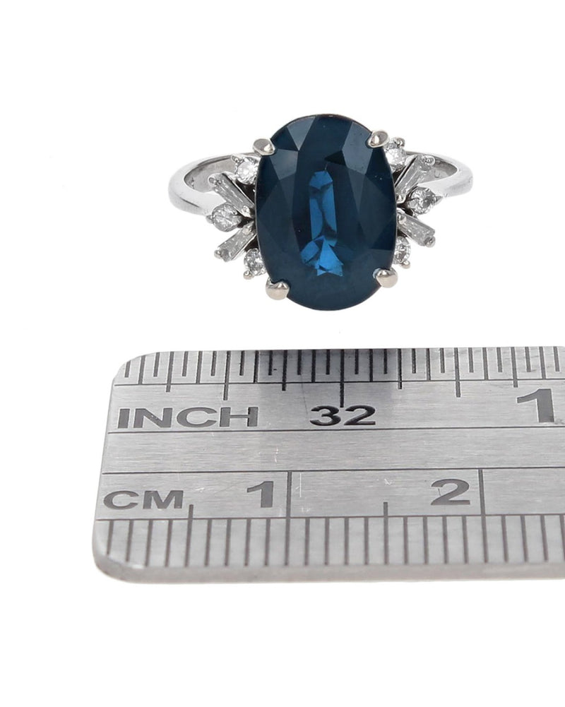Dark Blue Sapphire and Diamond Accent Ring in Yellow Gold