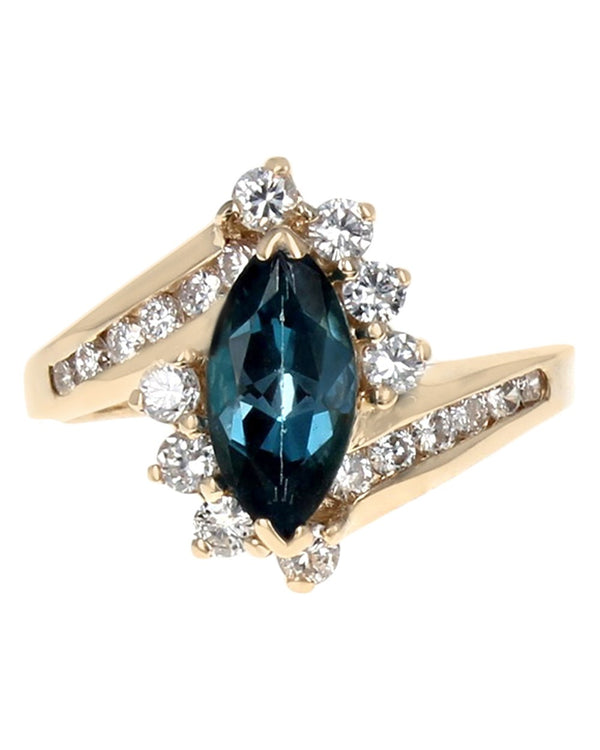 London Blue Topaz and Diamond Bypass Ring in Yellow Gold