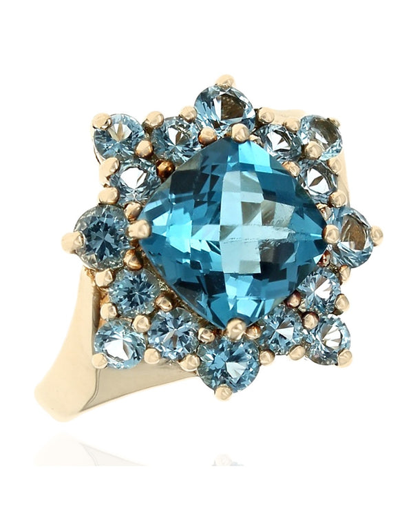 Blue Topaz Halo Ring in Yellow Gold