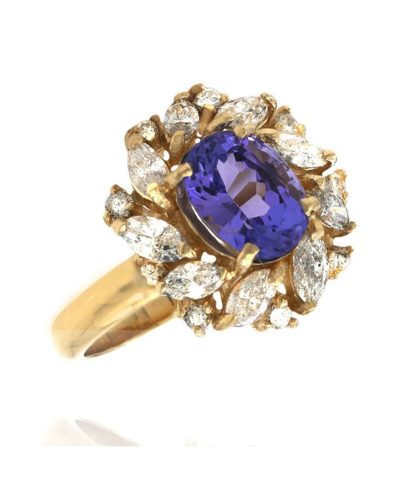 Oval Tanzanite Mixed Cut Diamond Halo Ring