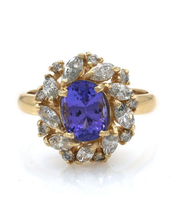 Oval Tanzanite Mixed Cut Diamond Halo Ring