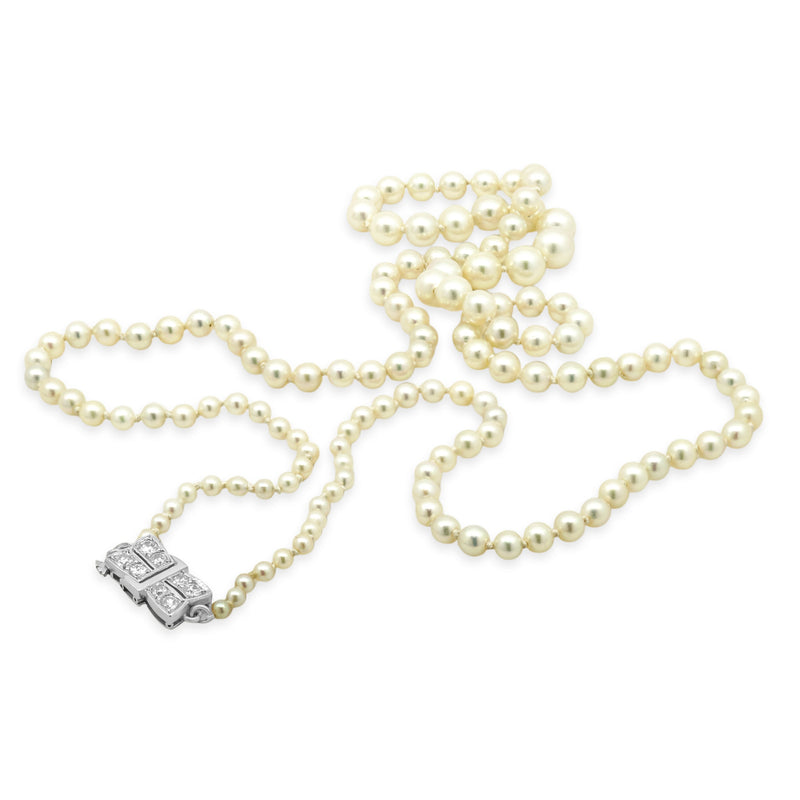 Platinum & 18 Karat White Gold Graduated Pearl Necklace with Pearl and Diamond Clasp