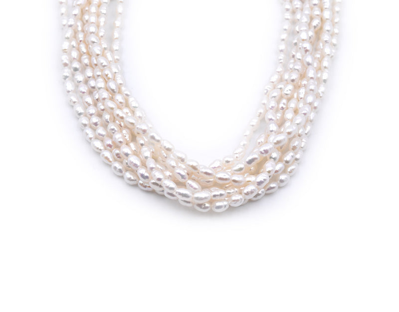 14 Karat Yellow Gold 8 Strand Potato Pearl Strand Necklace